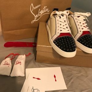 Red bottom sneakers men.